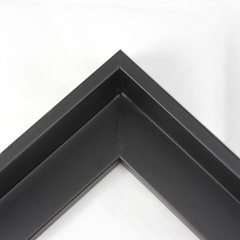 This L-shaped modern canvas floater frame, features a black smooth curved wall. 

*Note: These solid wood, custom canvas floaters are for stretched canvas prints and paintings, and raised wood panels.