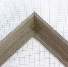 This 1-3/16 " deep L-shaped canvas floater features distressed wood in a light grey finish. The visible light peeks of wood grain are perfect for a rustic style.
