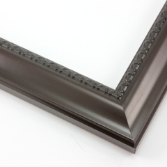 This shallow reverse scoop frame features a smooth face in a dark walnut wash with a subtle view of the natural wood grain. The inner lip is a horseshoe relief design in black, and the outer edge has a slight bevel.

1.5 " width: ideal for medium size artwork.  The simple elegance of this frame makes it the perfect border for photographs, paintings and giclee prints.