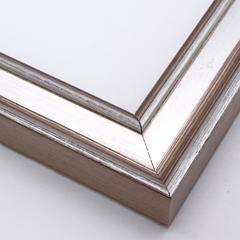 This frame features a deep crown moulding profile finished in silver leaf.  An antique look is achieved with a gentle brushed effect that highlights the corners of the bevelled edges.

2.125 " width and 1.25 " depth: ideal for medium to large images.  Border a black-dominant grayscale photograph or acrylic painting with this stylishly simple frame.