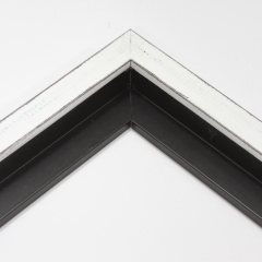 This simple, flat faced canvas floater frame features rustic wood lightly coated in white paint.  The top coat is rubbed away in places to reveal the natural wood color below, for a soft, antiqued look.

3/4 " wide: ideal for small and medium-size images.  Whether photography or paintings, rural scenes and simple images will look striking in this frame.