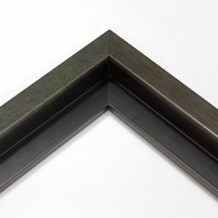This simple, grey-brown canvas floater frame features a slim, flat face and natural wood grain finish. Dress it up with an old watercolor or oil painting, or keep it modern with a bright family photograph. 

.75 "es wide: ideal for small images.