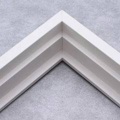 This stair step floating canvas frame has a matte white finish. The canvas will hover neatly, resting on the lowest, flat edge.  

Give an authentic, fine art display to your favourite canvas Giclée print or acrylic painting. This canvas floater is ideal for medium to extra large canvases on thick (1.5 " deep) stretcher bars.

*Note: These solid wood, custom canvas floaters are for stretched canvas prints and paintings, and raised wood panels.