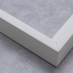 This simple, L-shape canvas floater frame features a .625 " face and deep, 1.825 " rabbet, finished with a classic matte white.

Display your favourite gallery wrapped Giclée print or painting with authentic, fine art style. Ideal for floater framing large and extra large, thick (1.5 " deep) stretched canvases.

*Note: These solid wood, custom canvas floaters are for stretched canvas prints and paintings, and raised wood panels.