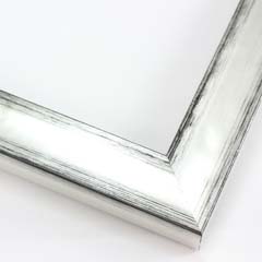 This glossy silver frame has a subtle scoop face with black distressed scratching on the outer edges. The drop edge is the same silver-foil as the face.

1-1/8 " width: ideal for small to medium size artwork. Oil or acrylic paintings, or simple portrait photographs will get a high-fashion pop from this frame.
