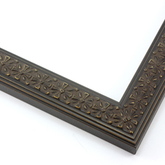 This slim, ornamented design features bevelled inner and outer edges and a celtic cross  pattern in relief.  The solid wood frame is covered in a deep brown, with a subtle gold patina that gives it an antiqued look.

1.25 " width: ideal for smaller artwork.  Photographs, paintings and giclee prints will shine within this detailed frame.