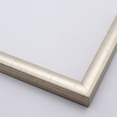 This high shine, silver foil frame features a slim curved profile.  A brushed finish reveals subtle lines and faint black spattering gives an antique look - simple, yet glamorous. 

11/16" " width: ideal for smaller images.  Select an oil or watercolour painting, print, or grayscale photograph.