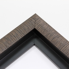 This black with brown stain frame, features a slight lifted curved profile with darken lines and natural wood finish.

Ideal for medium and large artworks. The clean modern lines and natural details of this frame make it the perfect fit for a wide variety of paintings, photos and giclee prints.