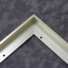 This metal canvas floater picture frame has a smooth silver finish and flat, narrow (.25 ") face. 

Ideal for medium to large size artwork on thin (.75 " deep) stretcher bars.  Border gallery wrapped Giclée canvas prints or paintings with this simple, modern frame for an authentic, fine art display.

*Note: These sturdy metal, custom canvas floaters are for stretched canvas prints and paintings, and raised wood panels.

Nielsen mf13-14 Profile