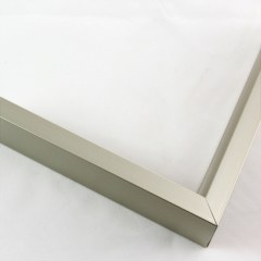 Tall, yet slim 7/16 " metal frame with a hooked profile. This moulding is dark grey silver with a slight brushed texture. It reflects diluted light.

Nielsen n117-14 Profile