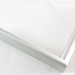 Slim 5/16 " metal frame. This frame comes in metallic white-silver. The face has a frosted texture and reflects dispersed light. The profile features a horizontal brushed texture.


Nielsen n22-02 Profile