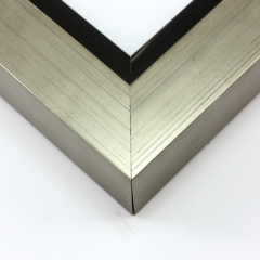 This large profile, L-shape floating canvas frame features a wide, 1.5 " face in a bold, brushed silver.

Display your favourite gallery wrapped canvas Giclée print or painting with authentic, fine art style. This floating canvas frame is ideal for large and extra large images on thick (1.5 " deep) stretcher bars.

*Note: These solid wood, custom canvas floaters are for stretched canvas prints and paintings, and raised wood panels.
