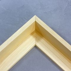 This L-shaped canvas floater frame features a natural finish, with a 1-5/8 " depth for artworks.

*Note: These solid wood, custom canvas floaters are for stretched canvas prints and paintings, and raised wood panels.