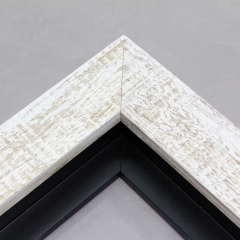 This simple but expressive floater frame features an organic wood grain face, complete with whorls and shallow ridges. The matte white finish is roughly applied for an antiqued look.

Ideal for medium and large size artworks. The natural simplicity of this countryside frame is the perfect match for nature or farmland photographs or oil paintings.