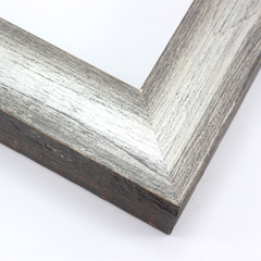 This simple but expressive frame features a smooth, natural wood face with a rougher, organic drop edge. The matte grey finish is overlaid with silver for an antiqued richness.

1.75" width: ideal for medium size artworks. The natural simplicity of this countryside frame is the perfect match for nature or farmland photographs or oil paintings.