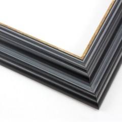 This stepped, reverse scoop frame with raised outer edge features a blue-grey wash that highlights the natural wood grain.  The recesses of the profile are a whiter shade, and cracked gold foil adorns the inner lip.

1.75 " width: ideal for medium size images.  A wide variety of photographs, paintings and prints will be enhanced within this unique frame.
