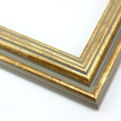 This stepped, reverse scoop frame with raised outer edge features a cracked gold foil.  The recesses of the profile are a creamy grey colour.

1.75 " width: ideal for medium size images.  A wide variety of photographs, paintings and prints will be enhanced within this unique frame.