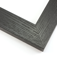 This simple, matte shine frame features a smooth black face that does not obscure the rich, natural wood grain. It is a delicate, modern take on a basic style.

1.75 " width: ideal for medium or large images.  Border a bold, white-dominant greyscale photograph, or acrylic painting or Giclée print in this subtle frame.