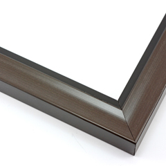 This simple, bold frame features scoop profile with a walnut-wash with a subtle brushing effect. The inner lip is stepped down and painted a matte black.

1.25 " width: ideal for small or medium size artworks. Due to it
