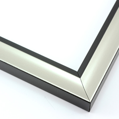 This simple, bold frame features scoop profile and silver foil face.  The inner lip is stepped down and painted a matte black, to match the outer drop edge.

1.25 " width: ideal for small or medium size artworks. Due to it