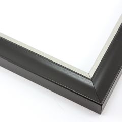 This simple, bold frame features scoop profile and matte black face with subtle crosshatching.  The inner lip is stepped down and covered in silver foil.

1.25 " width: ideal for small or medium size artworks. Due to it