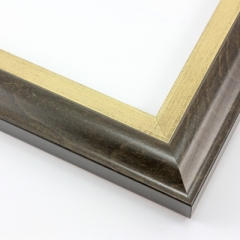 This solid wood frame features an elegant curve-and-scoop profile that draws the eye inward.  The outer edge maintains the natural wood grain, and slightly distressed gold foil on the inner lip adds a subtle antique finish. The outside rim is an unobtrusive black.

1.75 " width: suitable for both medium and large images.