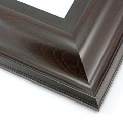 This wide, reverse scoop frame features a deep brown wash that highlights the natural wood grain.  The bevelled outer edge and stepped inner lip are matte black.

3.5 " width: ideal for oversize images. Bright acrylic and oil paintings or their giclee prints will shine in this classic frame.