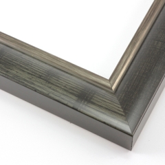 This solid wood frame features a steeply curved, matte black face brushed with matte grey crosshatching.  The inner lip is defined with muted silver foil.

1.75 " width: ideal for medium images. This highly versatile frame will suit a wide selection of photographs, paintings or giclee prints.