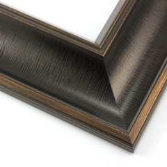 This bold frame features a steep reverse scoop profile with a broken line detail on matte black.  The inner lip drops sharply in toward the image; both edges are brushed with a subtle bronze leaf.

3 " width: ideal for large or oversize artwork. Select a strong image for this frame, to ensure the heavy border doesn