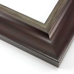 This elegant frame has a double scoop profile.  The outer, wider scoop brings out the natural wood in mahogany-brown. The inner lip features a subtle silver foil finish that maintains the wood grain.

2.5 " width: ideal for large and extra large images. Border a bold watercolour or oil painting, or your favourite print, in this stylish, classic frame.