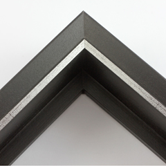 This deep, L-shape floating canvas frame features a glossy black, textured face with a brushed silver lip and deep, 1.75 " rabbet. The 45 degree angle of the face creates depth around the mounted canvas.

Display your favourite gallery wrapped Giclée print or painting with authentic, fine art style. This floater frame is ideal for medium to extra large canvases mounted on thick (1.5 " deep) stretcher bars.

*Note: These solid wood, custom canvas floaters are for stretched canvas prints and paintings, and raised wood panels.