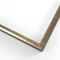 This 1/2 " frame features a scooped profile from a flat outer edge. Along with brown finish and delicate gold detailing creating horizontal lines across the scooped profile. The colors fade to create a seamless blend. The sides of the frame features a matte black finish.

1/2 " width: ideal for small artwork. This modern frame is suitable for a wide variety of art mediums, from photographs to paintings and giclee prints.