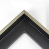 This L-shaped modern canvas floater frame, features a smooth curved wall, and a brushed silver face. 

*Note: These solid wood, custom canvas floaters are for stretched canvas prints and paintings, and raised wood panels.