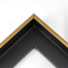 This Medium, L-shaped floating contemporary canvas frame in matte black features a thin brushed gold face.

*Note: These solid wood, custom canvas floaters are for stretched canvas prints and paintings, and raised wood panels.