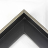 This Medium, L-shaped floating contemporary canvas frame in matte black features a thin brushed Silver face.

*Note: These solid wood, custom canvas floaters are for stretched canvas prints and paintings, and raised wood panels.