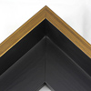 This Large, L-shaped floating contemporary canvas frame in matte black features a thin brushed gold face.

*Note: These solid wood, custom canvas floaters are for stretched canvas prints and paintings, and raised wood panels.