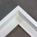 This elegant L-shaped canvas floater frame features a clean, contemporary profile finished in crisp white. The smooth finish and sharp angled edges create a modern gallery-style presentation, while the narrow face width offers a sleek, minimalist look.

Display your favourite gallery wrapped Giclée print or painting with authentic, fine art style. These canvas floating frames are ideal for medium and large images.

*Note: These solid wood, custom canvas floaters are for stretched canvas prints and paintings, and raised wood panels.