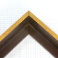 This 2-1/8 " deep L-shaped floating contemporary canvas frame in open grain espresso features a thin brushed gold face.

*Note: These solid wood, custom canvas floaters are for stretched canvas prints and paintings, and raised wood panels.