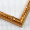 This 1 " ornate gold frame showcases a beautiful bamboo stem design that exudes elegance. Its rich, golden finish and intricate detailing make it a stunning choice for adding a touch of luxury and unique charm to any artwork or photograph.