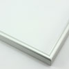 This simple metal picture frame has a frosted silver finish with a brushed outer drop edge and curved profile. 

.375 " width: ideal for small, medium and large artworks. Easily frame photographs, thicker cloth or needlework art, or even Giclée canvas prints.