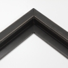 This simple, canvas floater frame features rustic wood lightly coated in charcoal grey/black paint.  The top coat is rubbed away in places to reveal the natural wood color below, for a soft, antiqued look.

3/4 " wide: ideal for small and medium-size images.  Whether photography or paintings, rural scenes and simple images will look striking in this frame.