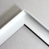 Mounted graphic (face mount) is adhered to the foater base. Can be mounted fush to edge, or
with desired float space.
