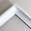 Mounted graphic  is adhered to the floater base. Can be mounted fush to edge, or
with desired float space.