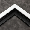 This matte white canvas floater frame features a slim, simple face. Dress it up with an old watercolor or oil painting, or keep it modern with a family photograph. 

.75 "es wide: ideal for small images.