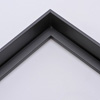 This simple, tapered edge canvas floater frame features a narrow face with a drop edge that widens internally toward the base.  This style, in a classic matte black, lends a unique hovering effect to your framed canvas. 

Display your favourite gallery wrapped Giclée print or painting with authentic, fine art style. These slender canvas floating frames are ideal for smaller, .75 " deep (thin) stretched canvases.

*Note: These solid wood, custom canvas floaters are for stretched canvas prints and paintings, and raised wood panels.