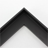This small, L-shaped floating canvas frame in matte black features a simple flat face.

*Note: These solid wood, custom canvas floaters are for stretched canvas prints and paintings, and raised wood panels.