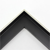 Elegant 1 " deep floater frame. The silver face and black interior have a satin finish.

This slim molding is best suited for framing small to medium works of art.