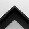 This extra tall, L-shaped floating contemporary canvas floater frame in black features a thin flat face.

*Note: These solid wood, custom canvas floaters are for stretched canvas prints and paintings, and raised wood panels.