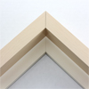 This large, L-shaped floating contemporary canvas frame in natural tone features a wide flat face.

*Note: These solid wood, custom canvas floaters are for stretched canvas prints and paintings, and raised wood panels.
