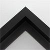 This large, L-shaped floating contemporary canvas frame in matte black features a wide flat face.

*Note: These solid wood, custom canvas floaters are for stretched canvas prints and paintings, and raised wood panels.